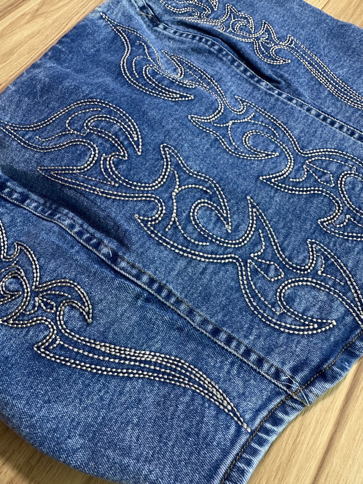 Stone wash boot stitched denim corset top