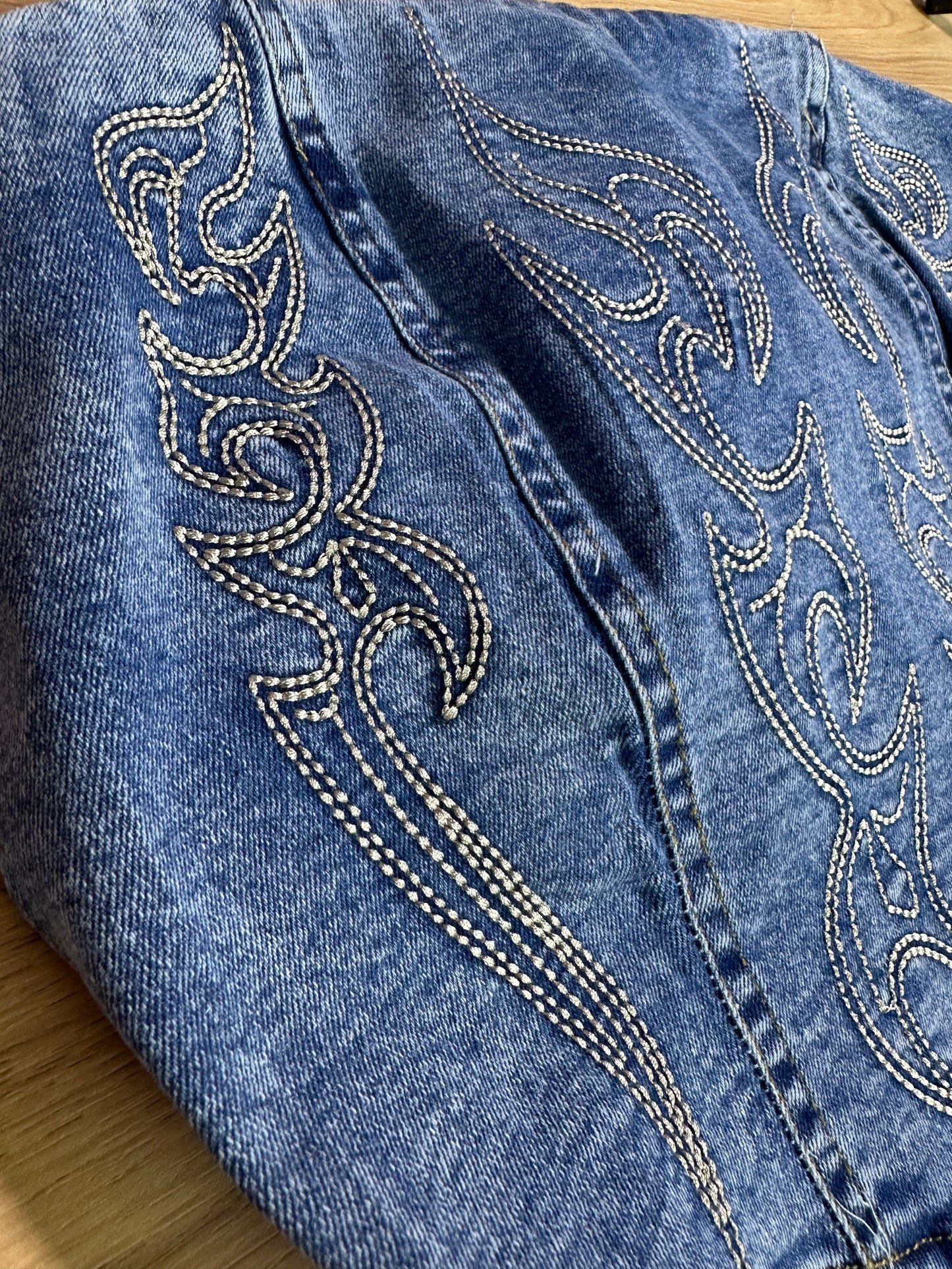 Stone wash boot stitched denim corset top