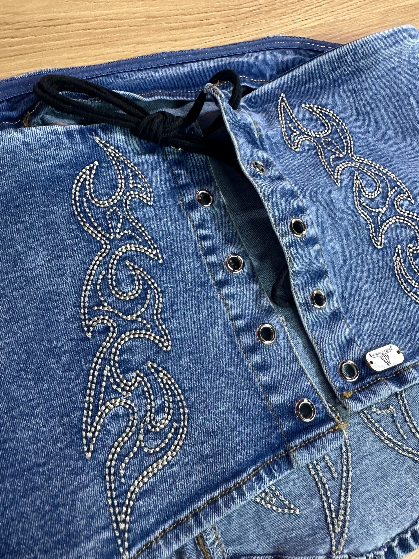 Stone wash boot stitched denim corset top